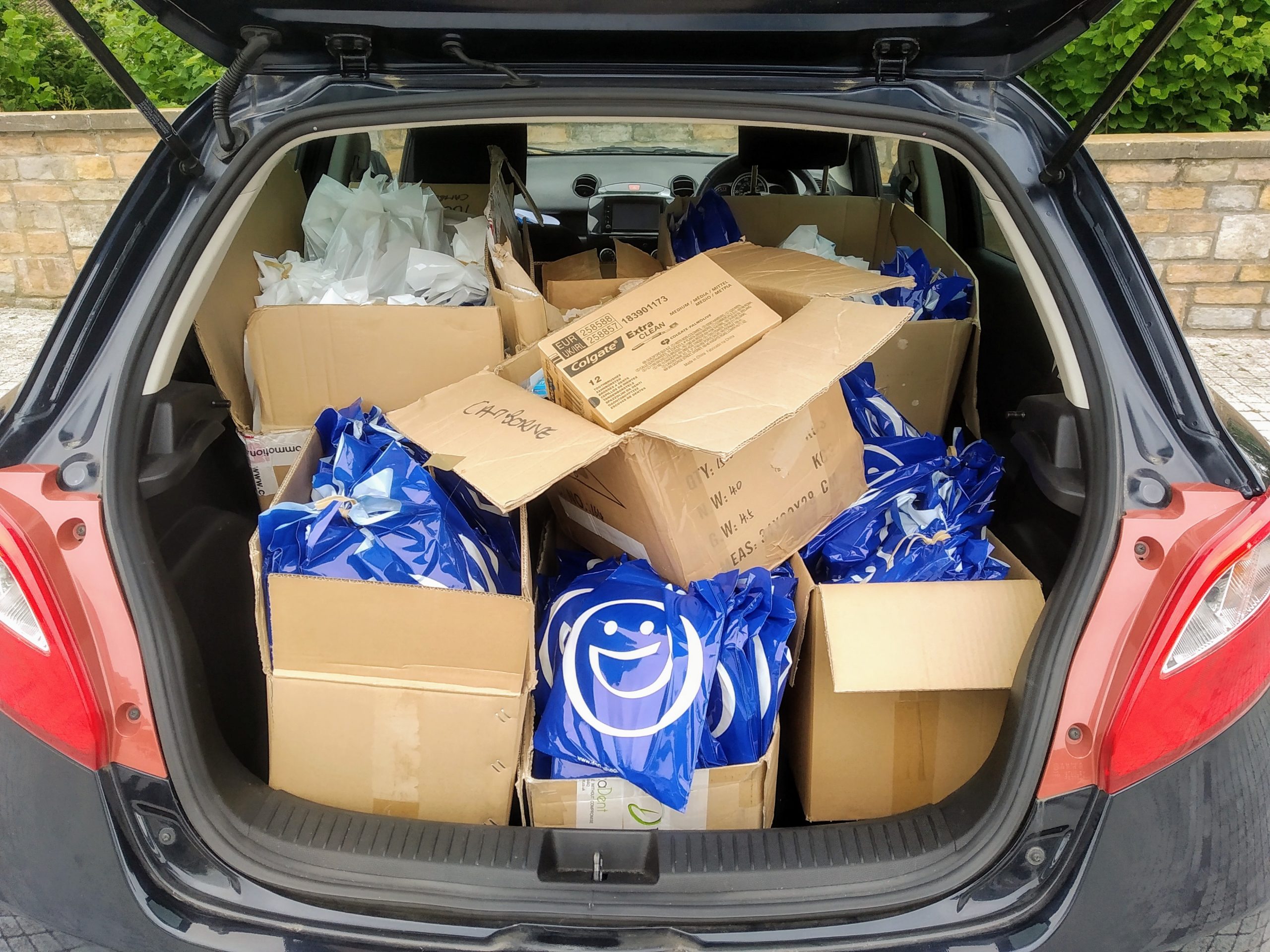 Brighter Smiles car boot full of oral health packs for donation