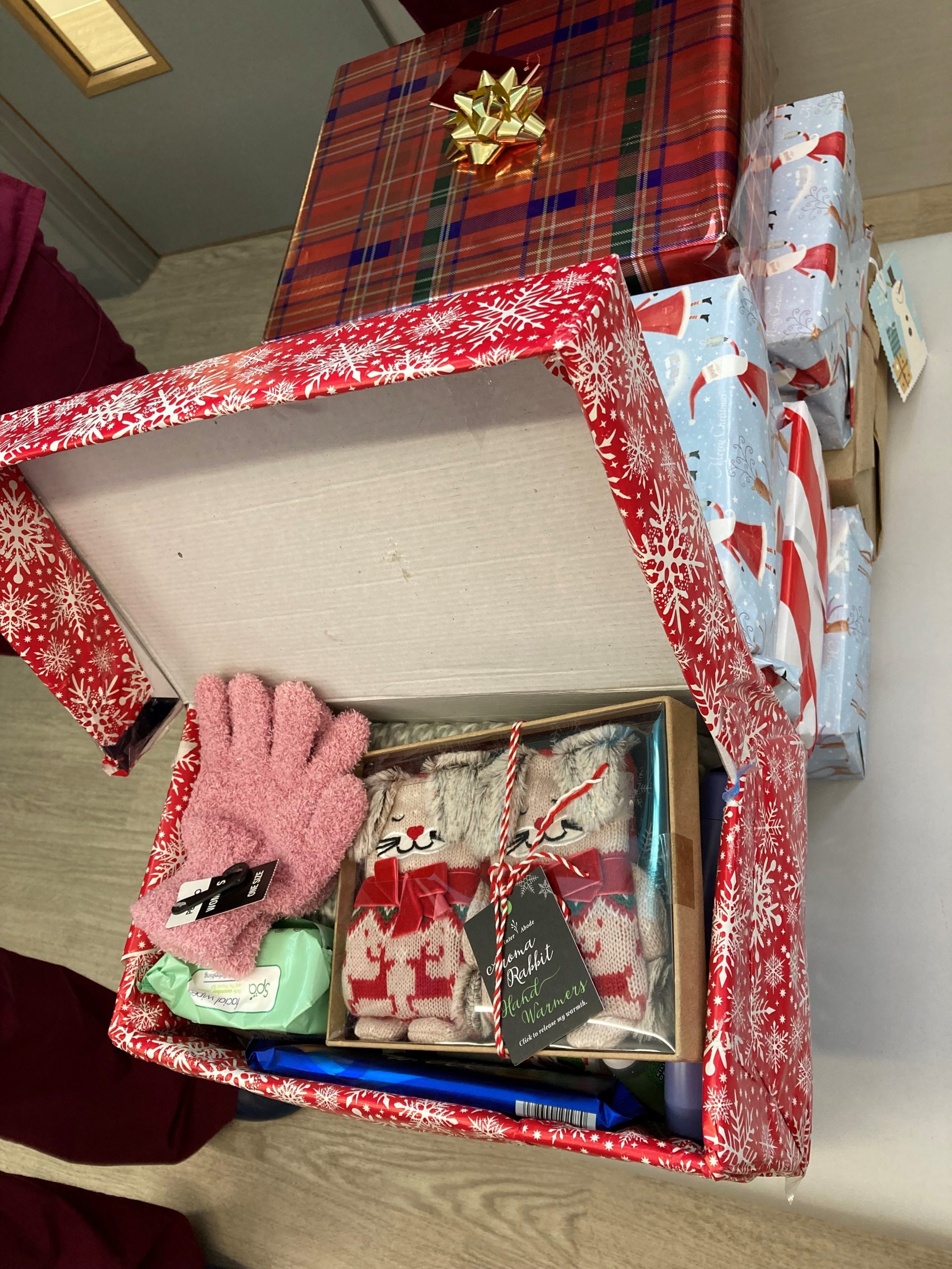 Shoeboxes containing items for donation to homeless people