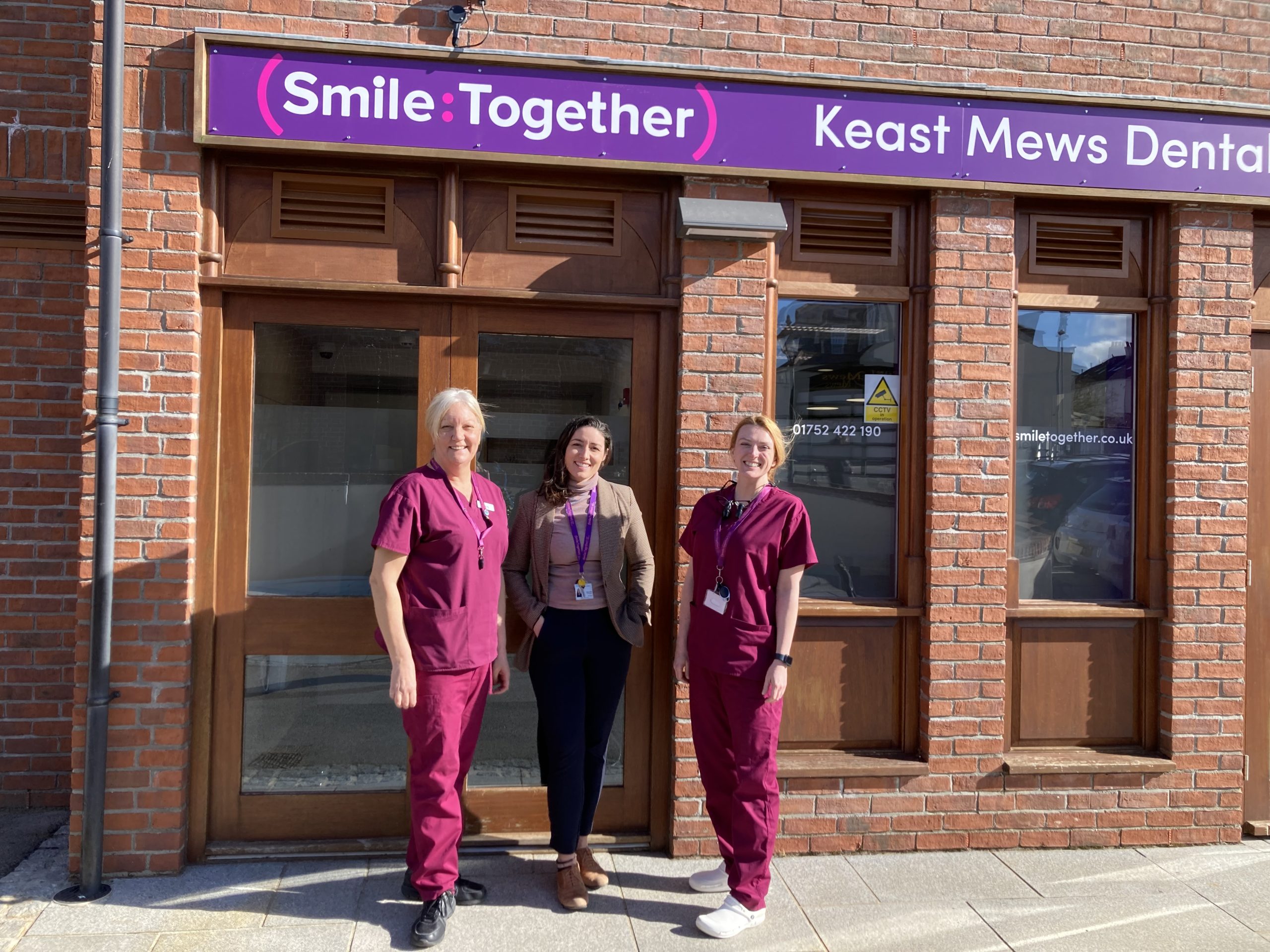 Liz and colleagues outside Keast Mews dental centre